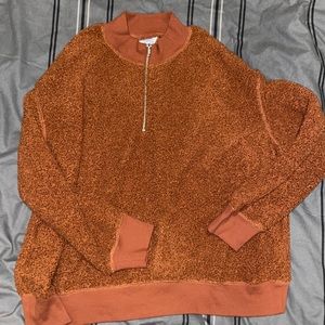rust colored long sleeve
